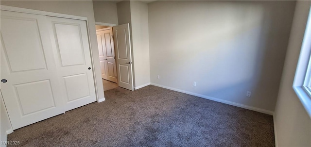 7910 Shimmery St, North Las Vegas, NV 89084 - unfurnished bedroom with carpet flooring, baseboards, and a closet