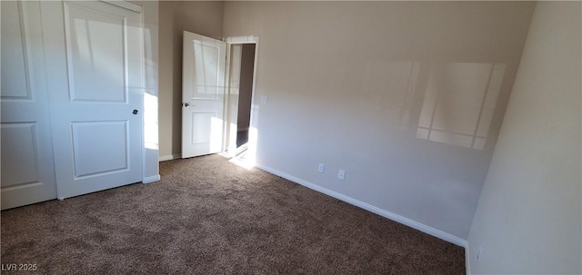 7910 Shimmery St, North Las Vegas, NV 89084 - unfurnished bedroom featuring carpet floors and baseboards