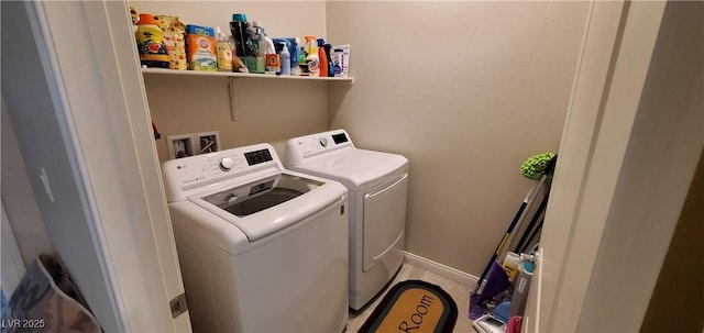 7910 Shimmery St, North Las Vegas, NV 89084 - washroom with washing machine and dryer and baseboards