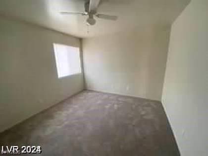 unfurnished room with ceiling fan