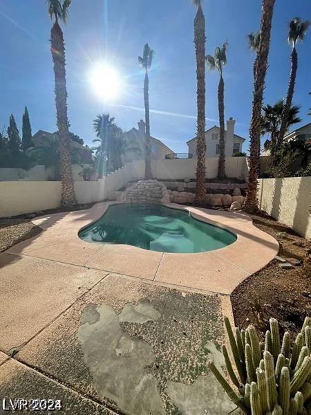 view of pool featuring a fenced in pool and a fenced backyard