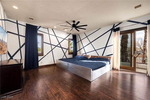 bedroom featuring multiple windows, visible vents, dark wood-type flooring, and recessed lighting