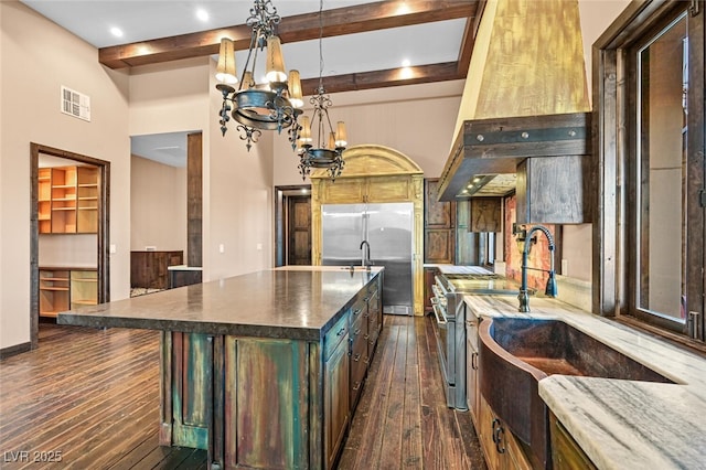 kitchen featuring a notable chandelier, high quality appliances, visible vents, dark wood-style floors, and beamed ceiling