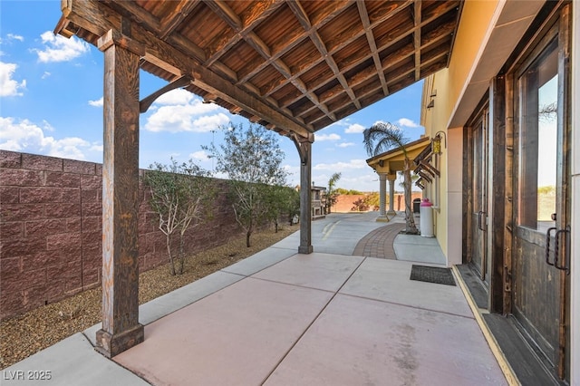 view of patio with fence