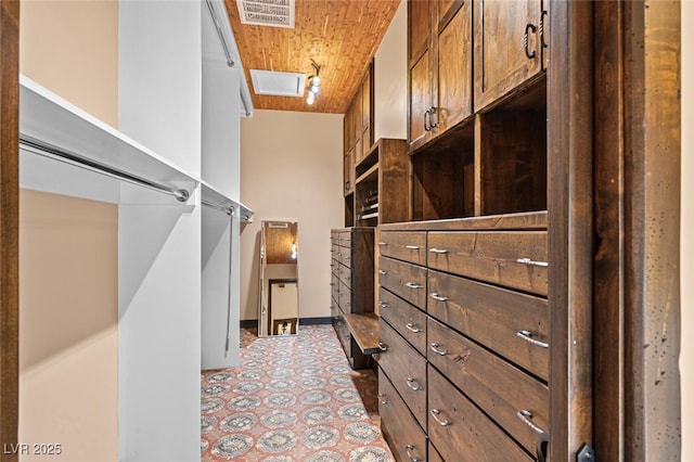 walk in closet featuring light floors and visible vents