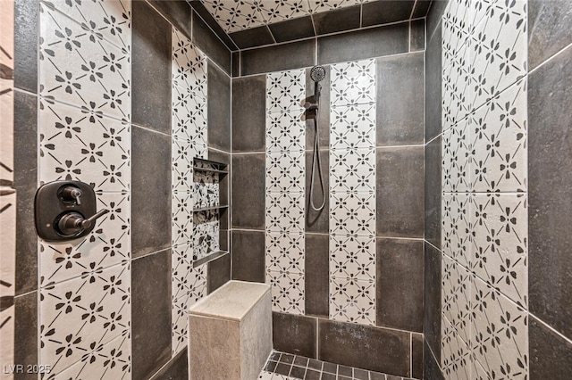 full bath with tiled shower