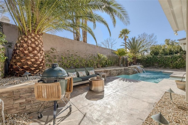 view of patio featuring a fenced backyard, an outdoor living space, and a fenced in pool