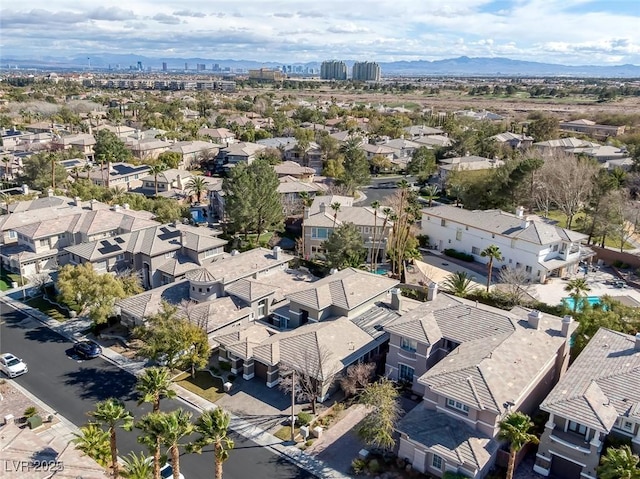 drone / aerial view with a residential view and a mountain view