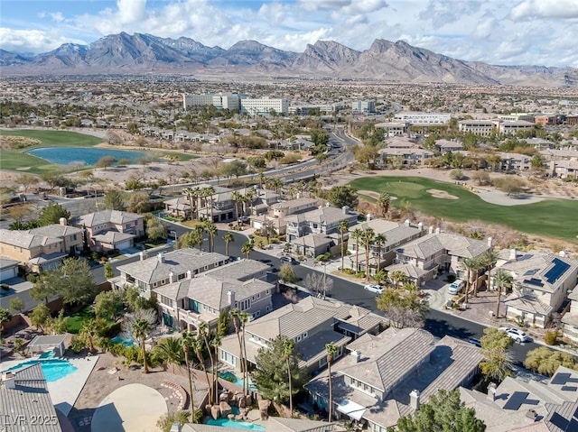 bird's eye view with a residential view, a mountain view, and golf course view