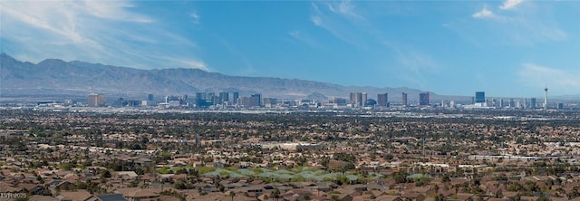 mountain view featuring a view of city