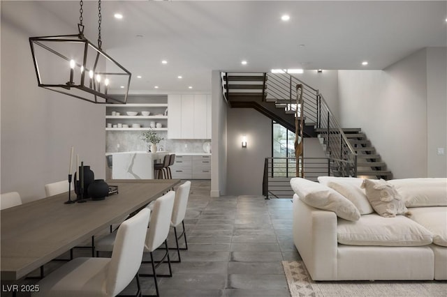 interior space with stairs and recessed lighting