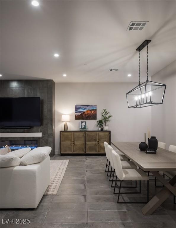 dining area featuring visible vents and recessed lighting