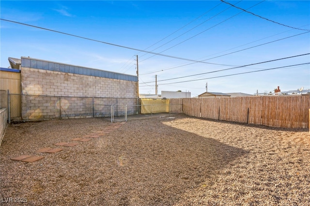 view of yard featuring a fenced backyard