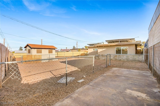 view of yard with a patio and a fenced backyard