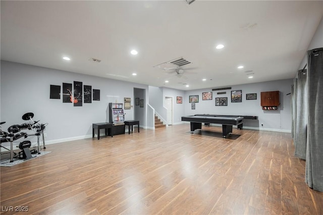 recreation room featuring recessed lighting, light wood-style flooring, and baseboards