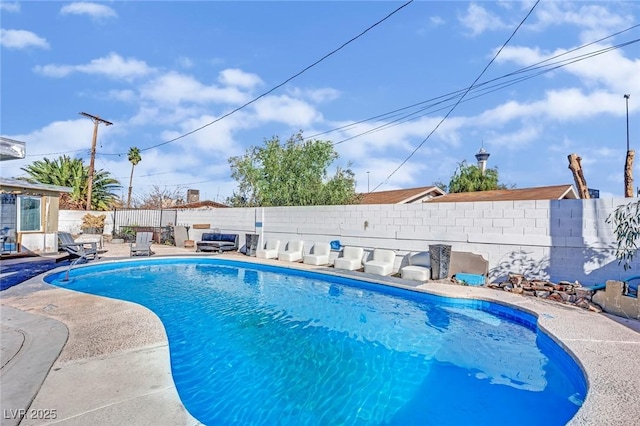 view of swimming pool with a fenced backyard and a fenced in pool