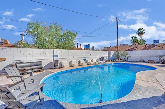 view of swimming pool with a fenced in pool and a fenced backyard