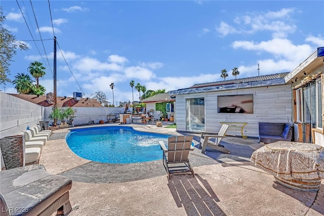 view of pool with a patio, a fenced backyard, and a fenced in pool