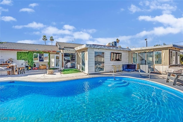 pool featuring a patio