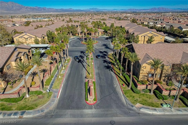 drone / aerial view featuring a mountain view and a residential view