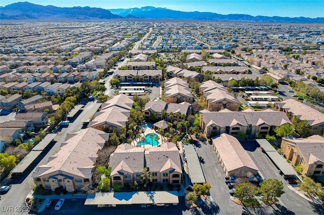 bird's eye view with a residential view and a mountain view