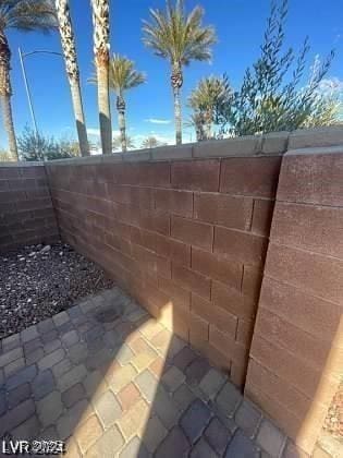 exterior details featuring fence