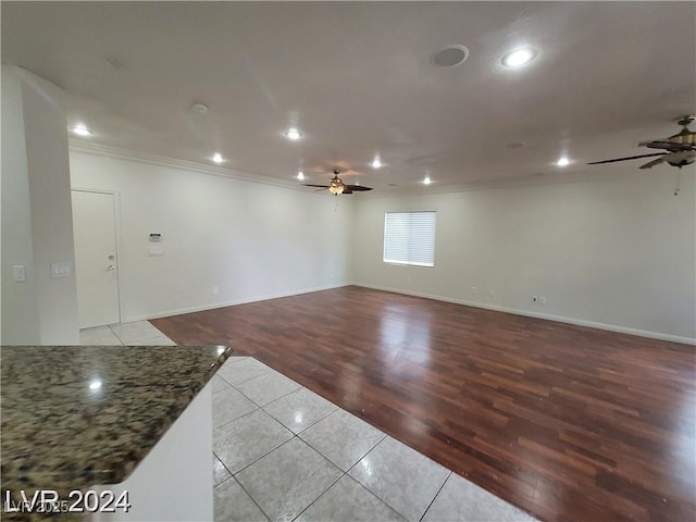 unfurnished room with ceiling fan, recessed lighting, light tile patterned flooring, and crown molding