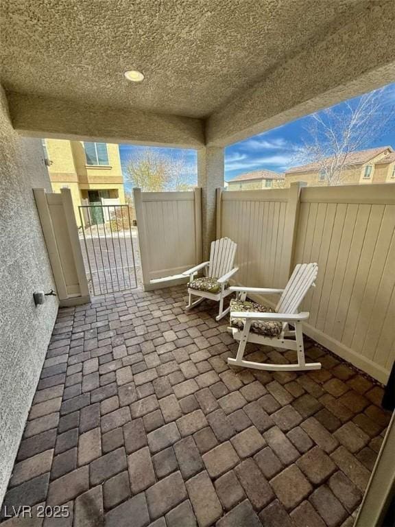 view of patio / terrace with fence