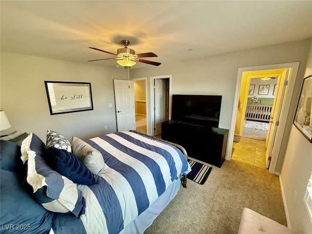 bedroom with light carpet and ceiling fan