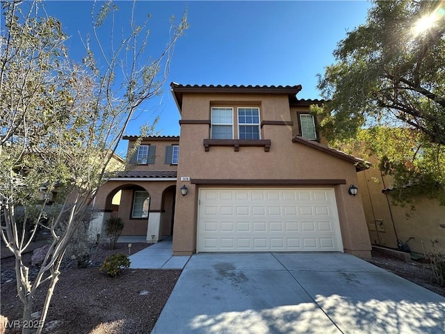 mediterranean / spanish home featuring driveway, a tile roof, a garage, and stucco siding