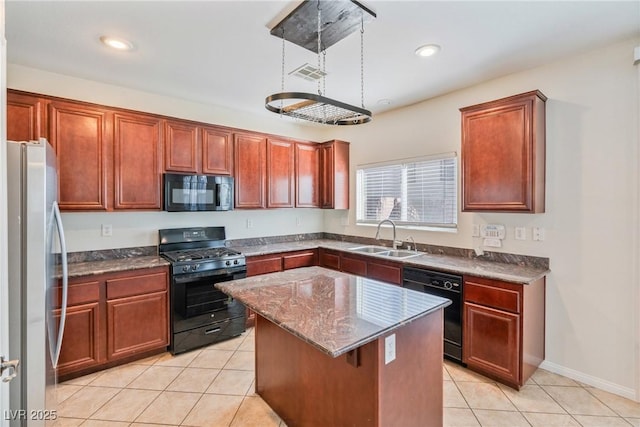 kitchen featuring black appliances, light tile patterned floors, visible vents, and a sink