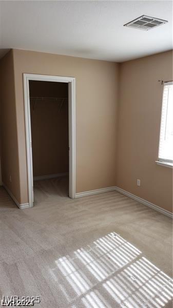 4798 Luna Ridge Ct, Las Vegas, NV 89129 - spare room with light colored carpet and baseboards
