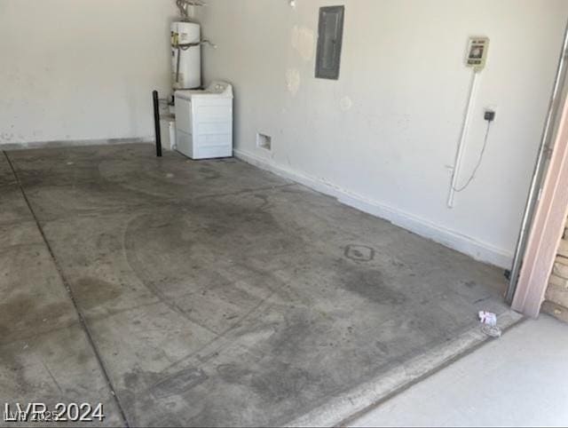 garage with washer / clothes dryer, electric panel, and strapped water heater