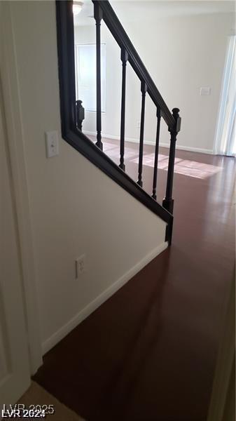 stairs featuring baseboards