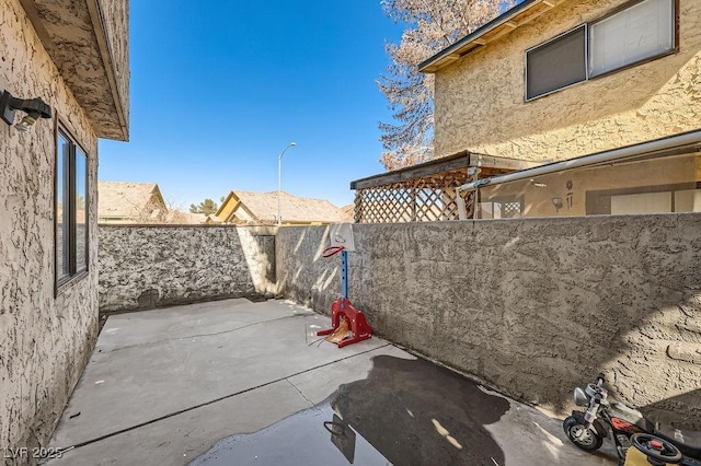 view of patio featuring a fenced backyard