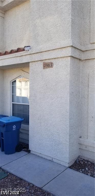 exterior space with stucco siding