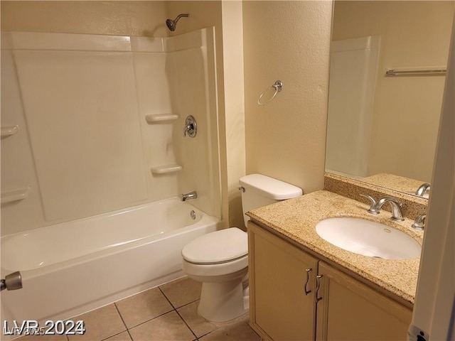 bathroom with a textured wall, toilet, shower / tub combination, tile patterned floors, and vanity