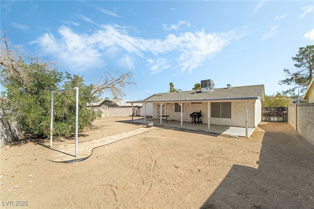 back of property featuring central air condition unit, a patio area, a fenced backyard, and stucco siding