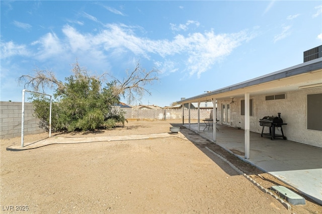 view of yard featuring a patio and a fenced backyard