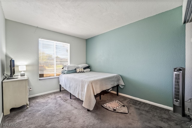 bedroom featuring baseboards, a textured ceiling, carpet flooring, and a textured wall