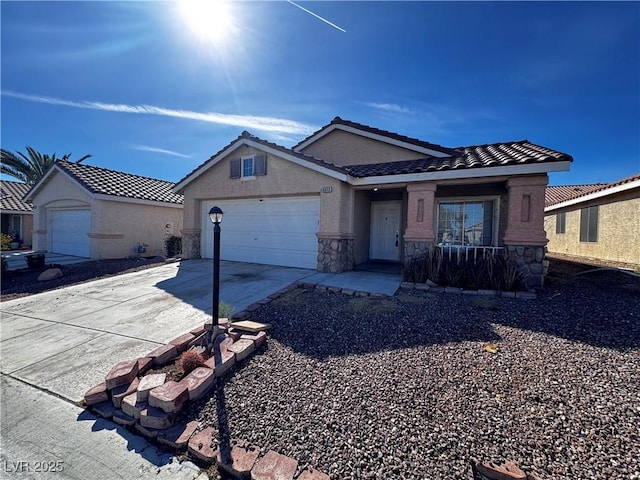 view of front facade featuring a garage, driveway, stone siding, a tiled roof, and stucco siding