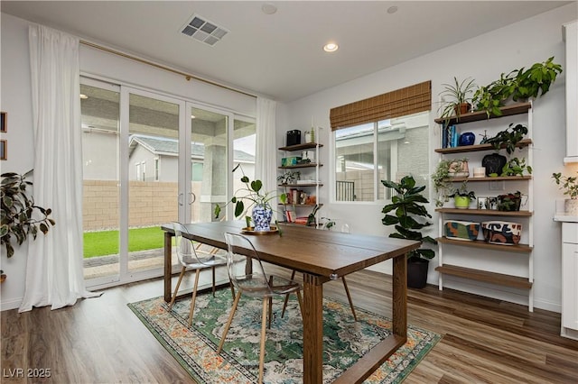 office with recessed lighting, visible vents, baseboards, and wood finished floors