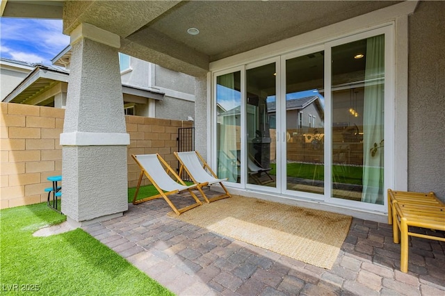 view of patio with fence