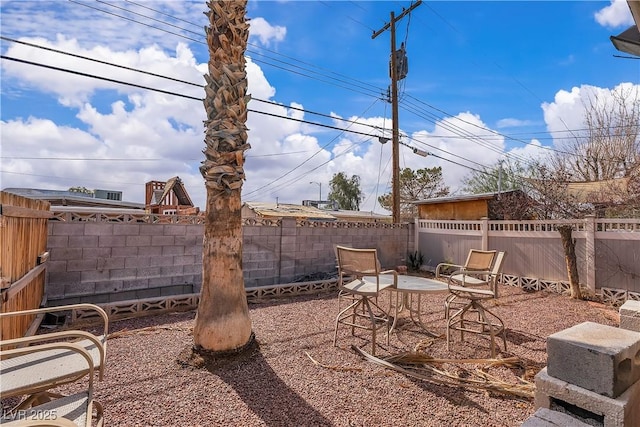 view of yard with a patio and a fenced backyard