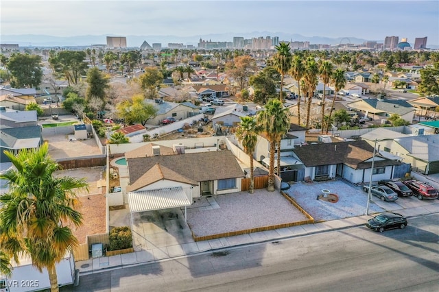 birds eye view of property with a view of city and a residential view