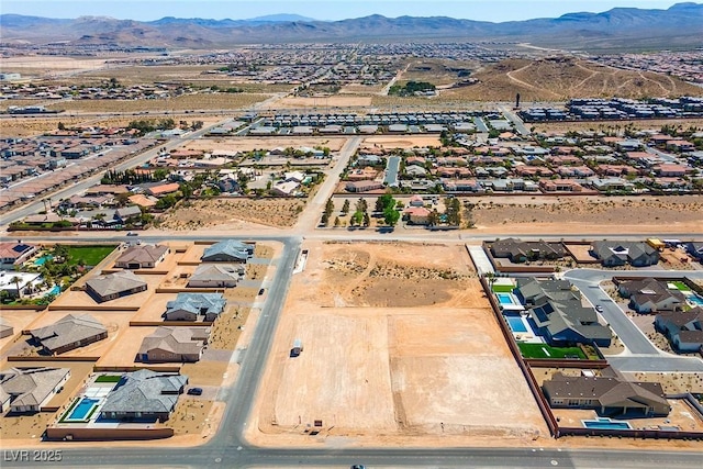 aerial view featuring a residential view and a mountain view