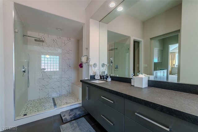 bathroom with vanity and walk in shower