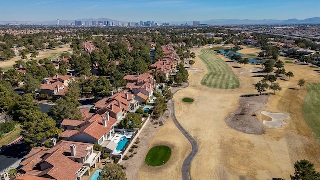 bird's eye view featuring a residential view, view of golf course, and a mountain view