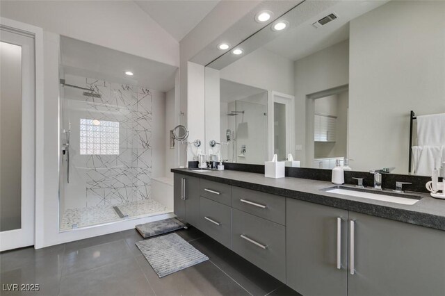 7999 Pinnacle Peak Ave, Las Vegas, NV 89113 - full bath with vanity, a stall shower, tile patterned floors, recessed lighting, and vaulted ceiling