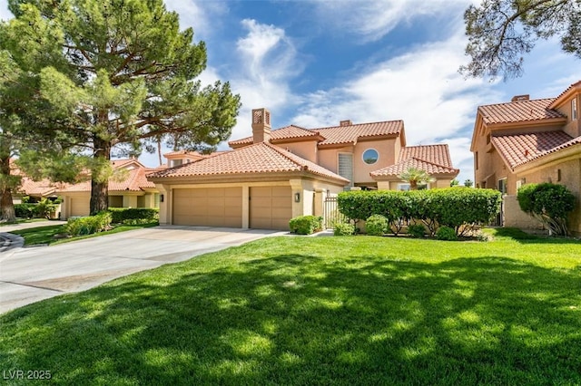 7999 Pinnacle Peak Ave, Las Vegas, NV 89113 - mediterranean / spanish home with an attached garage, stucco siding, concrete driveway, and a tiled roof